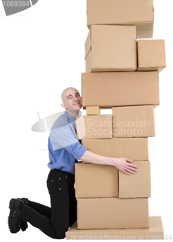 Image of Postman embrace cardboard boxes