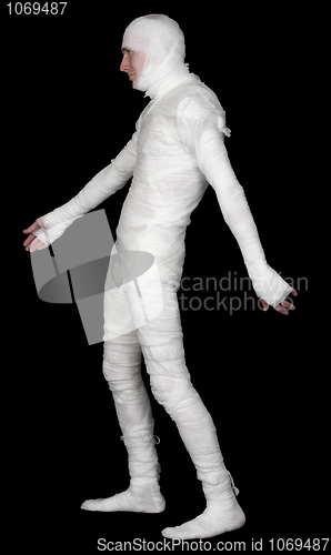 Image of Guy in bandage on a black background