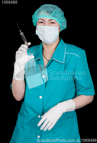 Image of Nurse with syringe in hand