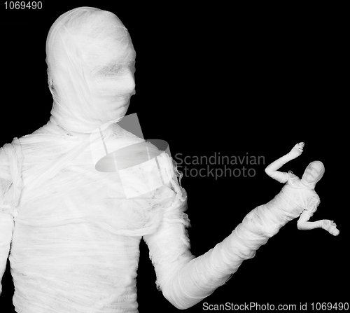 Image of Phantasmagoric mummy - puppeteer on a black