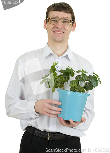 Image of Male portrait with window plant