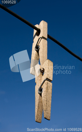 Image of Two wooden clothes-peg