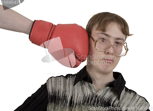 Image of Man of kick on boxer glove