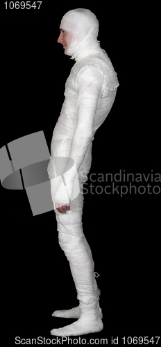 Image of The guy in bandage on a black