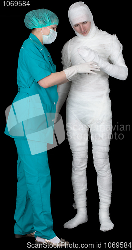 Image of Man in bandage and nurse