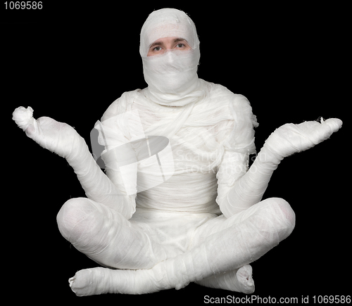 Image of Man in bandaged sit on pose lotus