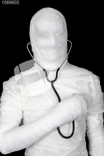 Image of Man in costume mummy with stethoscope