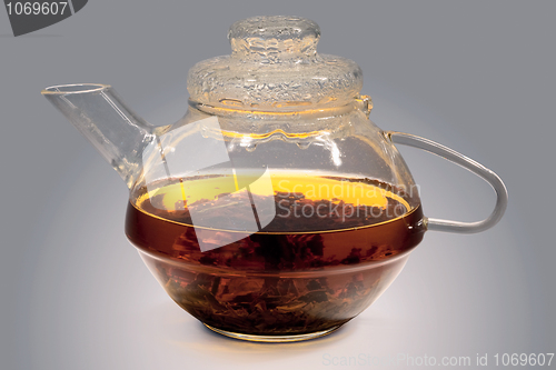 Image of Glass teapot with strong tea