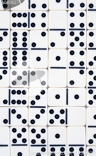 Image of Background from white dominoes pieces