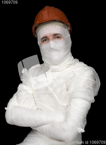 Image of Guy in bandage with the helmet 