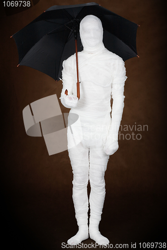 Image of Mummy with umbrella