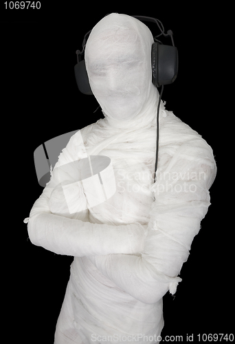Image of Man in bandage with ear-phones