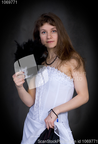 Image of Portrait of thel girl with a fan