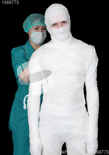 Image of Man in bandage and nurse