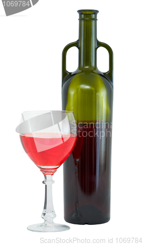 Image of Still-life with a glass of red wine and a bottle