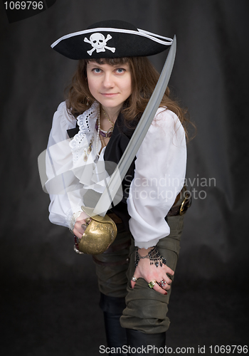 Image of The girl - pirate with a sabre in hands