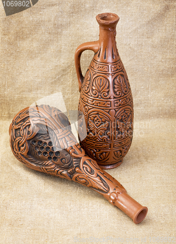 Image of Two ceramic brown bottles