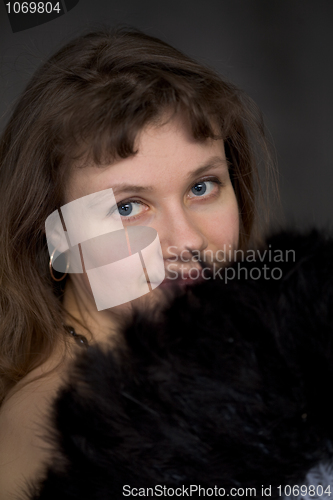 Image of Portrait of thel girl with a fan