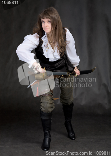 Image of The girl - pirate with a sabre in hands