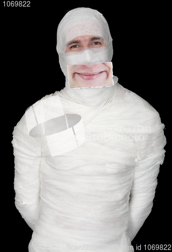 Image of Guy in bandage with a false smile