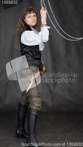 Image of The girl - pirate with a sabre in hands