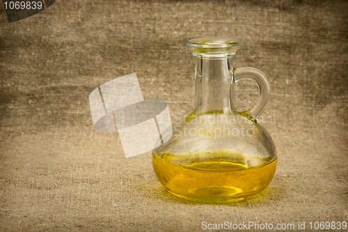 Image of Carafe with yellow oil