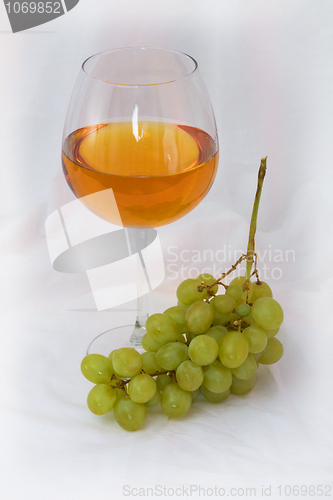 Image of Still-life with a glass of wine and grapes