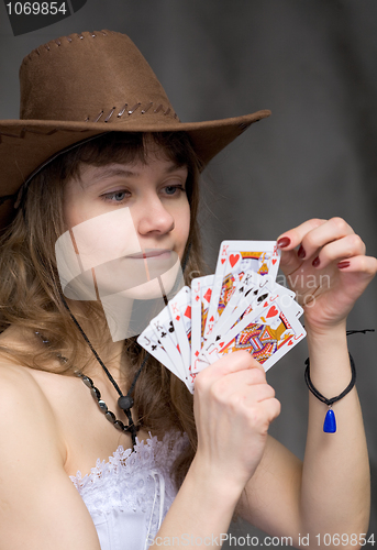 Image of Portrait girl with a playing-cards