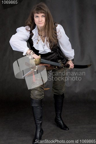 Image of The girl - pirate with a sabre in hands