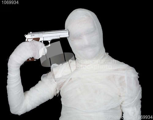 Image of Bandaged guy - self-murderer with pistol