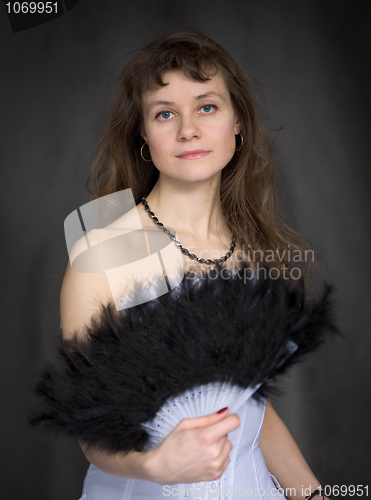 Image of Portrait of the girl with a fan