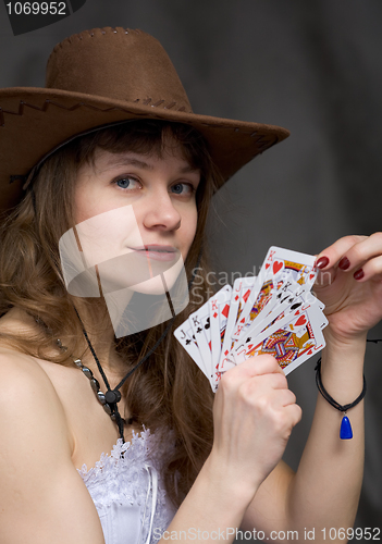 Image of Portrait girl with a playing-cards