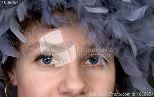 Image of Portrait of the girl with a boa closeup