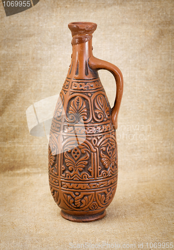 Image of Ancient brown ceramic bottle