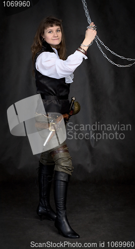 Image of The girl - pirate with a sabre in hands