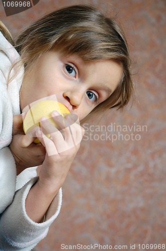 Image of child eating an apple