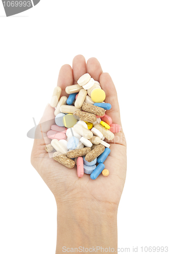 Image of pills in hands