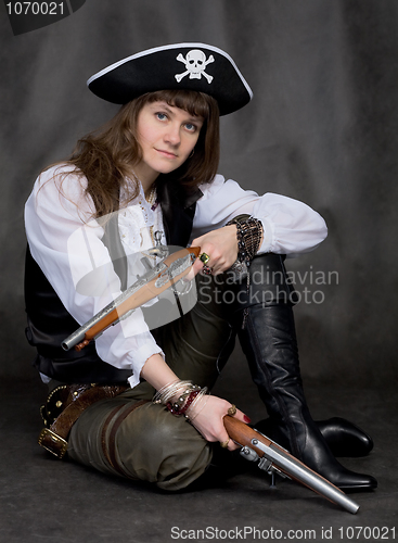 Image of Girl - pirate with two pistol in hands