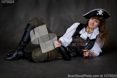 Image of Girl - pirate with pistol and bottle