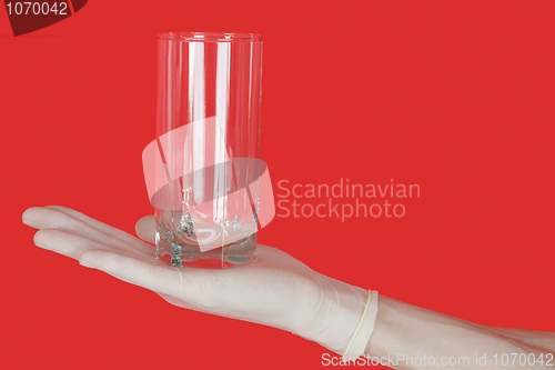 Image of Glass of water on hand