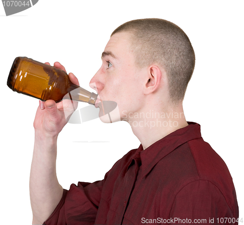 Image of Young man with brown bottle