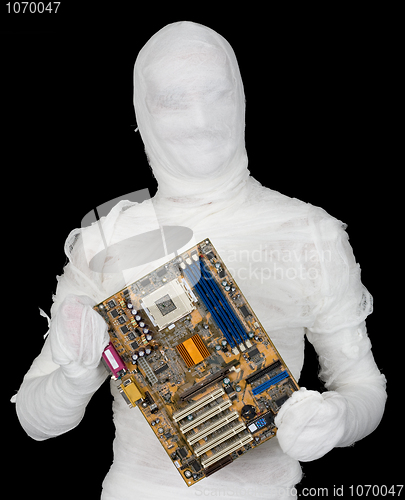 Image of Bandaged man with motherboard