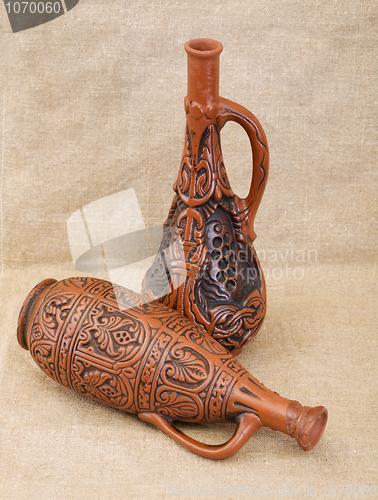 Image of Two ancient brown ceramic bottle