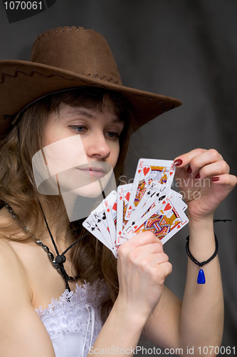 Image of Portrait girl with a playing-cards