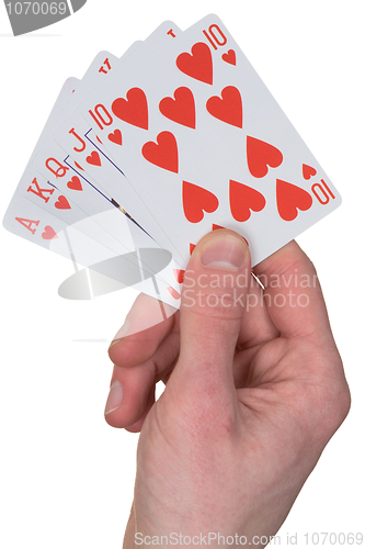 Image of Playing card with heart on hand