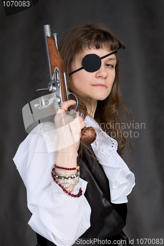 Image of Girl - pirate with pistol in hand and eye patch
