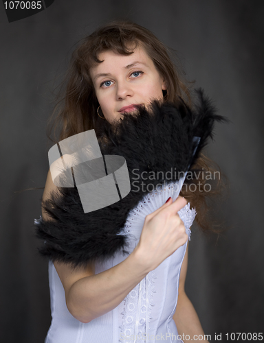 Image of Portrait of the girl with a fan