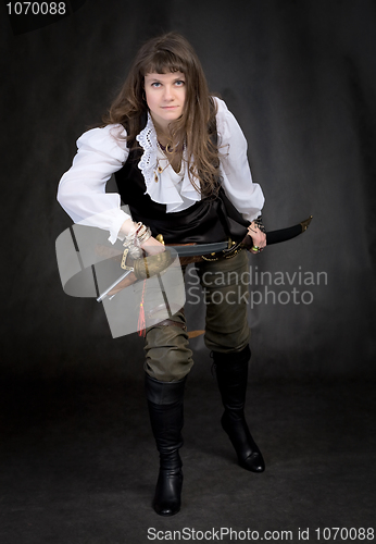 Image of The girl - pirate with a sabre in hands