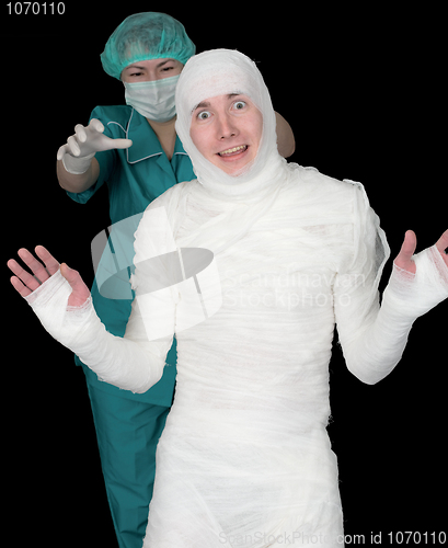 Image of Man in bandage and nurse