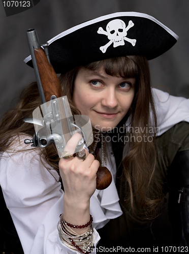 Image of Girl - pirate with pistol in hand